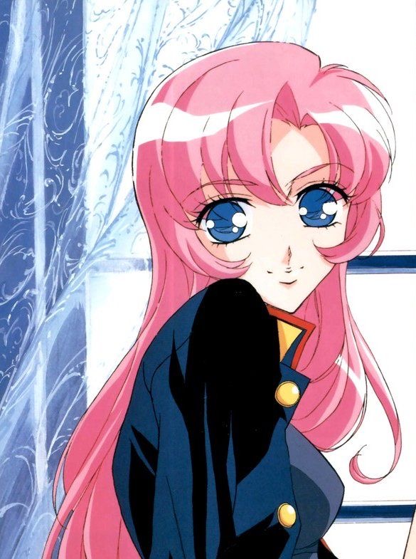 utena sitting and smiling at the camera
